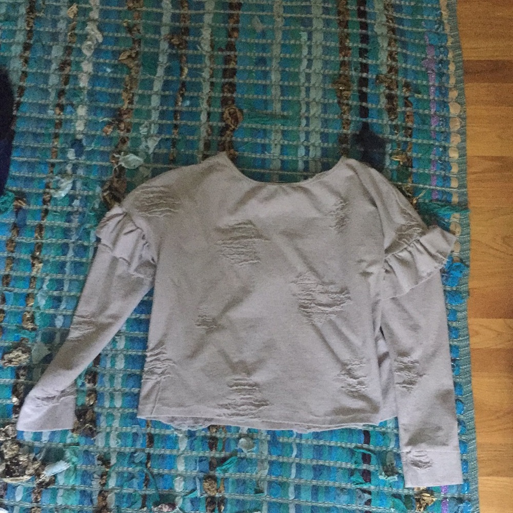 Distressed sweater